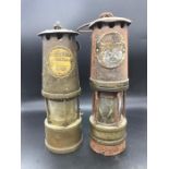 A Pair of Miners lamps.