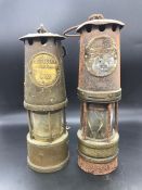A Pair of Miners lamps.