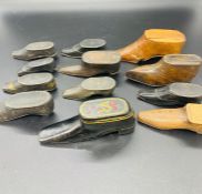 A Selection of Twelve snuff boxes of shoe form.