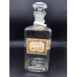 A Parisian Glass scent Bottle with original label