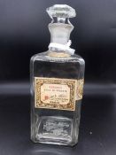 A Parisian Glass scent Bottle with original label