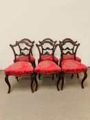 Set of six mahogany dining chairs, shaped back on cabriole legs