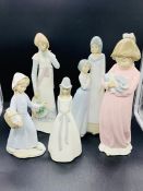 Five assorted figures in a Lladro style.
