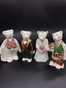 A selection of four Royal Crown Derby Bears to include, Diamond Jubilee Shopper Bear 821/1500