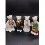 A selection of four Royal Crown Derby Bears to include, Diamond Jubilee Shopper Bear 821/1500