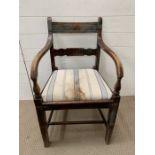 An open arm mahogany chair