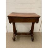 An Early 19th Century Mahogany Work Table on castors (H75cm W67cm D42cm)