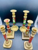 A Selection of three pairs of Contemporary Chinese Cloisonne candlesticks, red grounds.