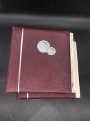 Two albums of coins, pennies 1940-1967, half pennies 1905-1962 and half pennies, three pences,