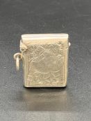 A Silver vesta case, makers mark JC, hallmarked Birmingham 1906.