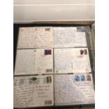 An extensive collection of vintage postcards over eight albums