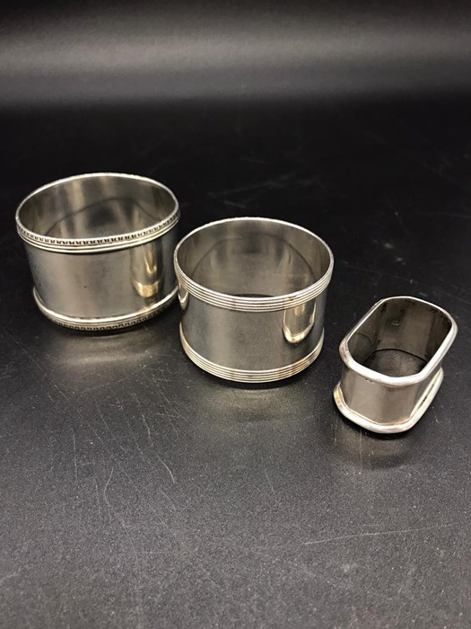 Three Silver Hallmarked napkin rings, various years and makers.