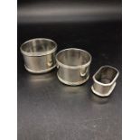 Three Silver Hallmarked napkin rings, various years and makers.