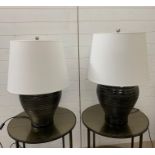 A pair of large textured ceramic table lamps