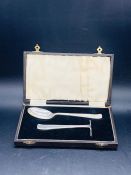 A Roberts and Dore Christening set in silver, boxed.