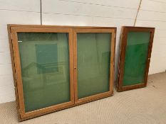 Two wall hanging display cases