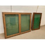 Two wall hanging display cases