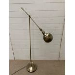 A floor standing reading lamp
