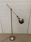 A floor standing reading lamp