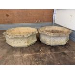 A pair of octagonal Gothic style concrete planters