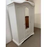 A contemporary white triple door wardrobe (H196cm W152cm D63cm)