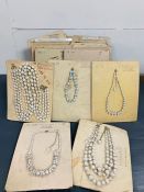 A box of 60's glass necklaces