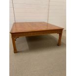 Large yew wood coffee table on reeded legs (H 43cm x D 107cm)