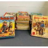 A Large selection of Vintage annuals with a Wild west theme