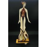 An Art Deco Figure of a Lady.