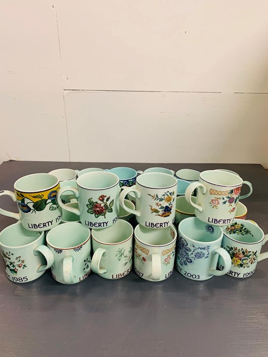 A Large selection of 29 Liberty store commemorative year mugs.