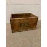 A vintage wooden bottle crate (H21cm W37cm D24cm)