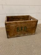 A vintage wooden bottle crate (H21cm W37cm D24cm)