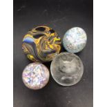 A selection of four paperweights