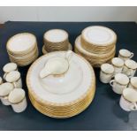 A Selection of Royal Doulton Gold Lace pattern dinner service to include: 12 bowls, 12 saucers, 12