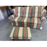 A two seater and three seater sofa with armchair and foot stool