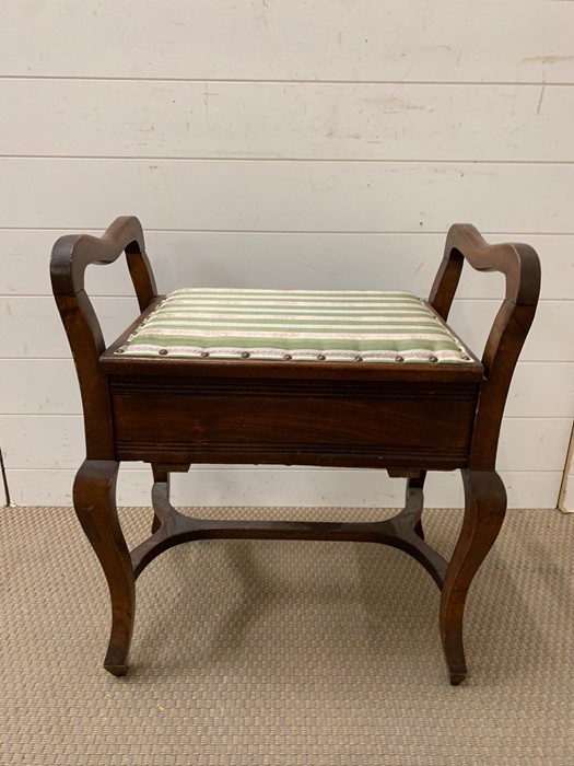 Mahogany piano stool with stretcher