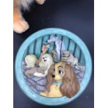 A selection of Lady and the Tramp collectable to include a teddy and four plates