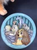 A selection of Lady and the Tramp collectable to include a teddy and four plates