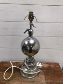 A white metal table lamp base