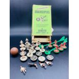 A Boxed collection of Subbuteo players including goalkeepers.