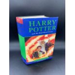 A First Edition Hard Back Harry Potter and the Half Blood Prince by J K Rowling with the misprint on