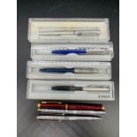 A selection of seven pens, to include Parker and Paper Mate inkpens and biros.