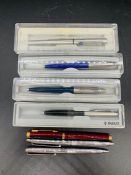 A selection of seven pens, to include Parker and Paper Mate inkpens and biros.