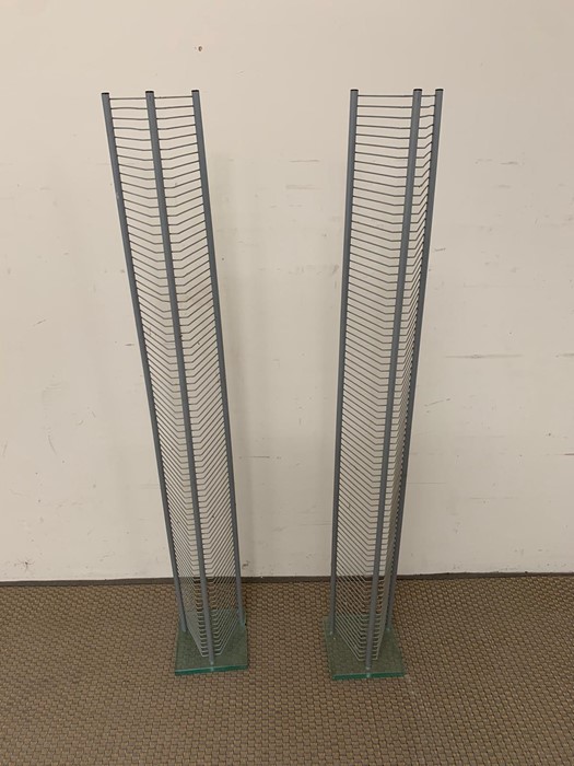 A pair of metal CD stands with glass base (H120cm)