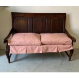 Jointed oak settle, with three back panels, strung seat and cushion on cabriole legs