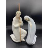A Lladro figurine of Saint Joseph, Nativity and Madonna kneeling