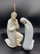 A Lladro figurine of Saint Joseph, Nativity and Madonna kneeling