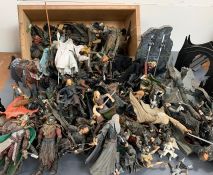 A large bundle of Lord of the Rings action figures, weapons and accessories