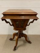 A Victorian walnut work table, hinged bur walnut top revealing fitted interior (H75cm W49cm D40cm)