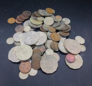 A Large Volume International coins and a few banknotes. Various countries, years and denominations.